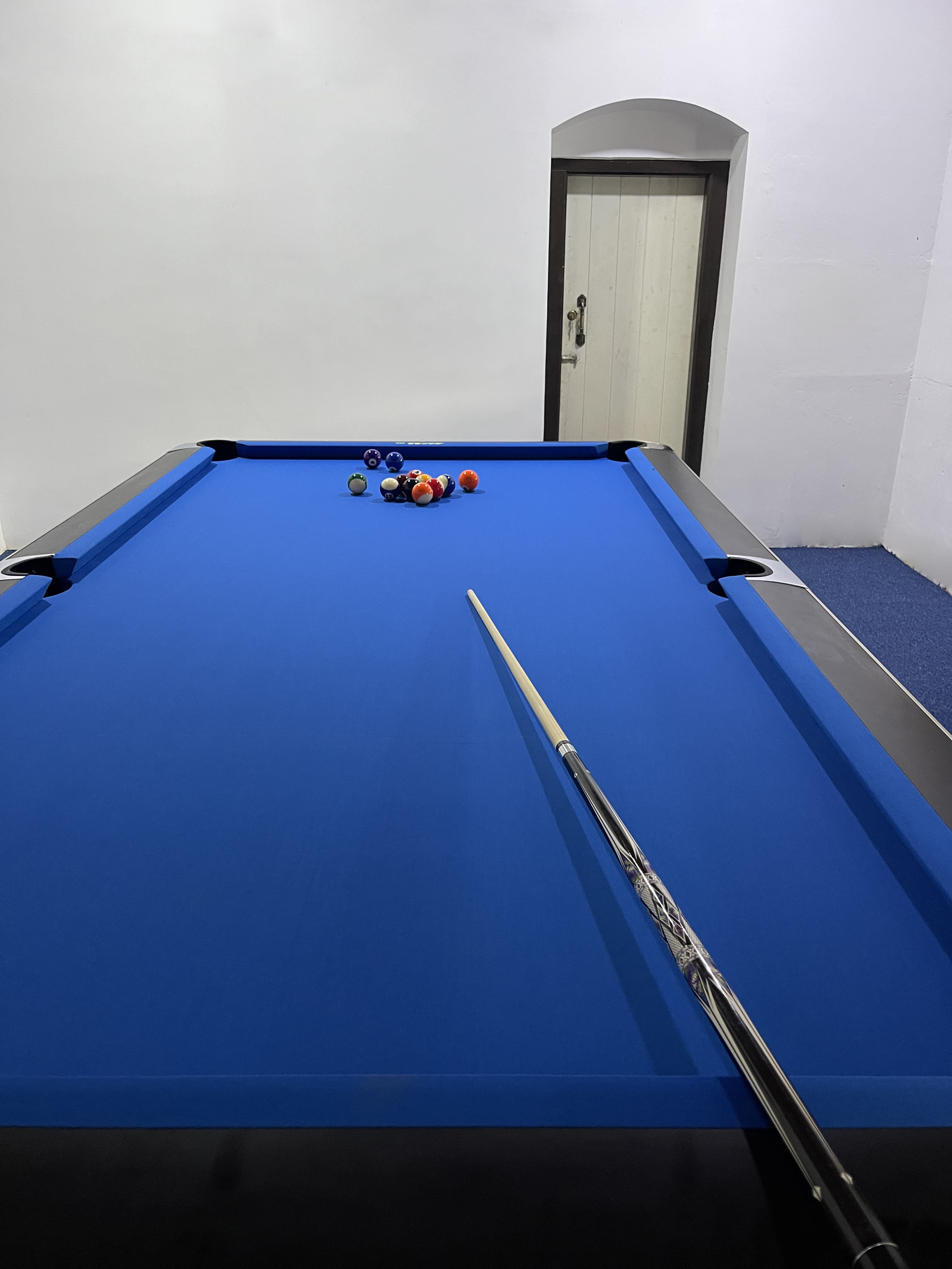 Challenge your friends to a game of 8-ball at Lavinrich where good vibes and friendly competition.