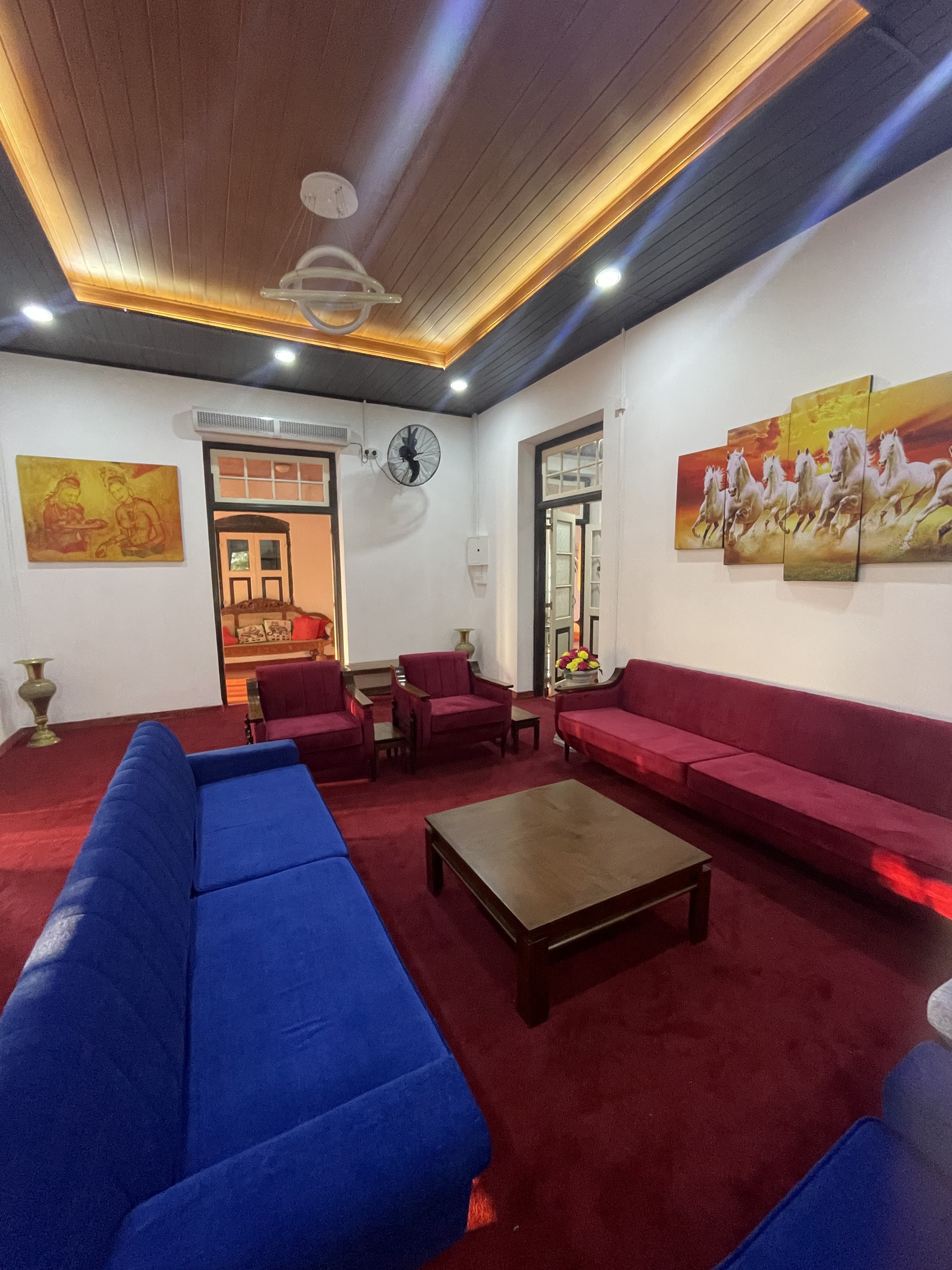 Relax in style at Lavinrich Hotel Horana this cozy lounge features vibrant seating, warm lighting